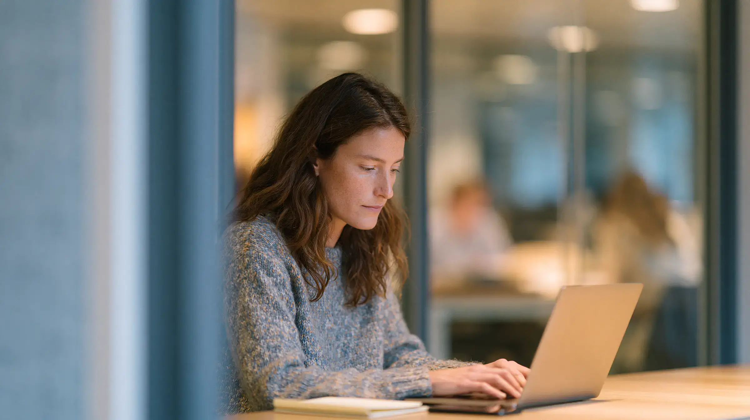 A data protection officer working securely on a laptop